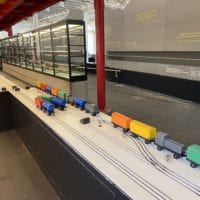 Activité avec des trains en bois au musée des transports de Lucerne